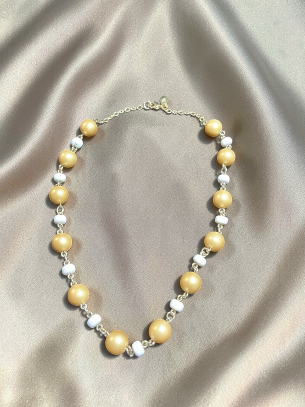Kenneth Jay Lane Gold and White Bead Link Necklace